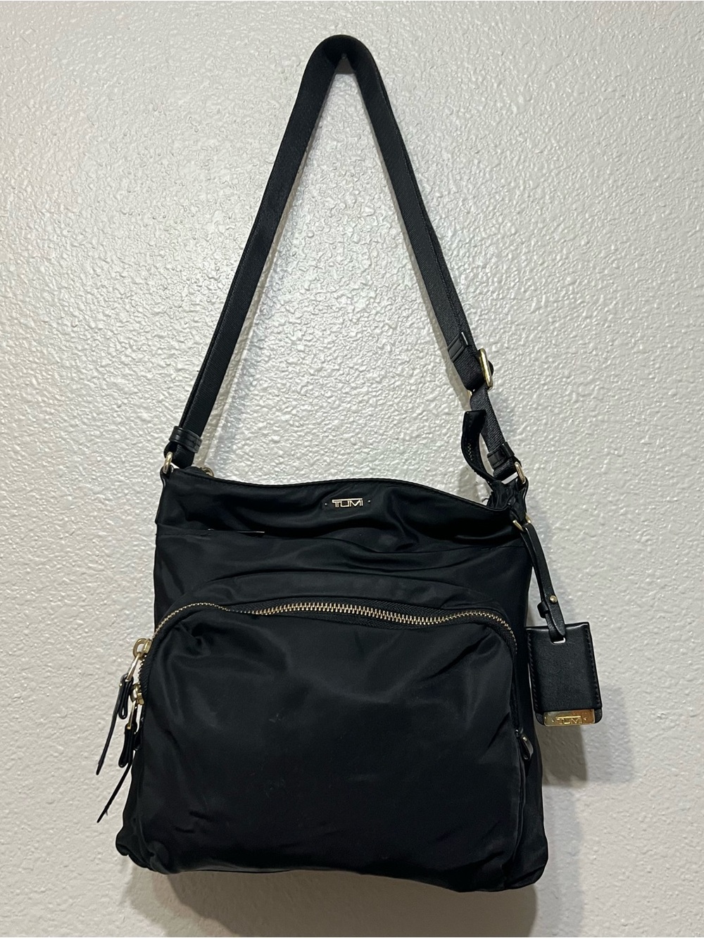 TUMI Voyageur Capri Messenger Crossbody Bag Black Nylon Gold